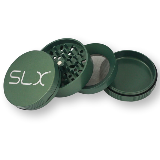 Green SLX grinder with four parts on a white background